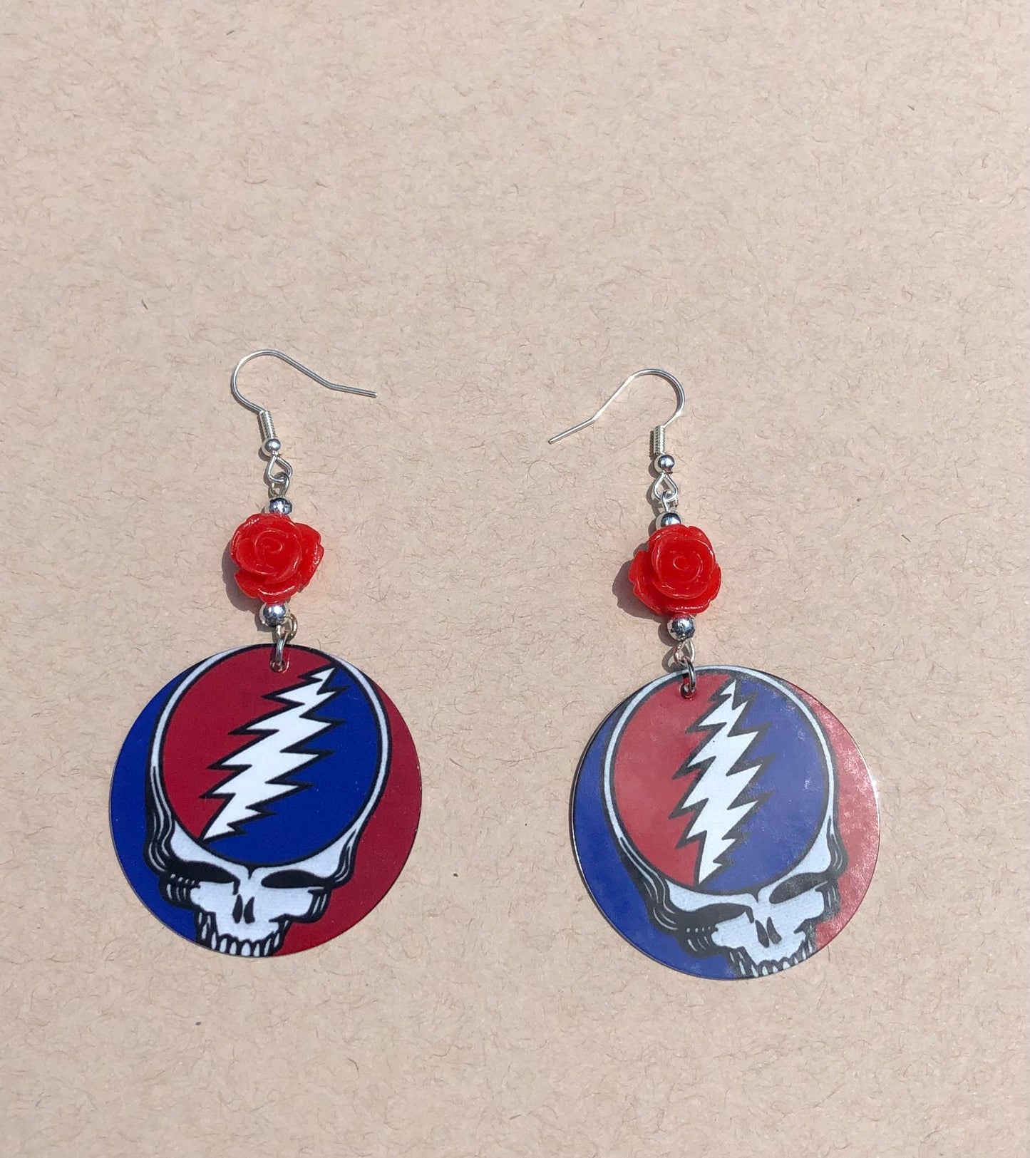 Steal your face round Dangle Earrings with a red rose bead. A Unique gift idea