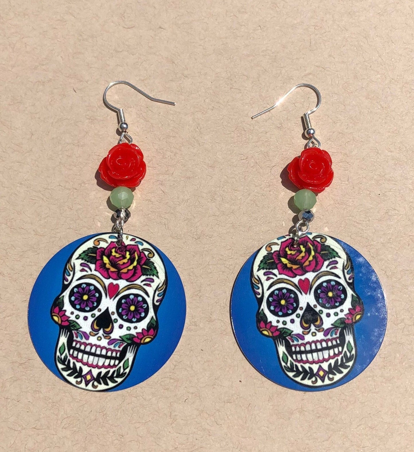 Sugar skull round Dangle Earrings with a red rose bead. A Unique gift idea