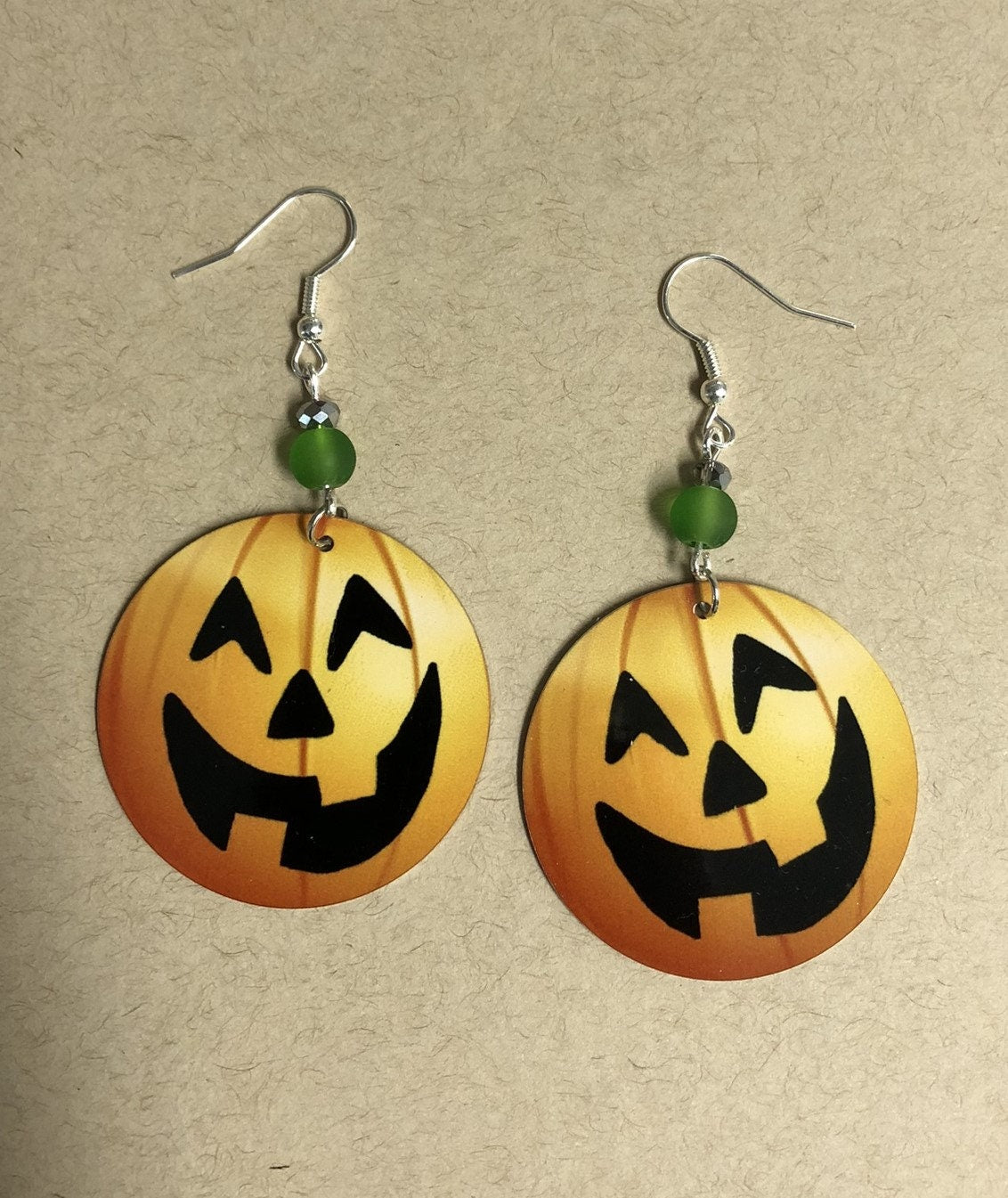 Pumpkin face round Dangle Earrings with a glass beads. A Unique gift idea for halloween